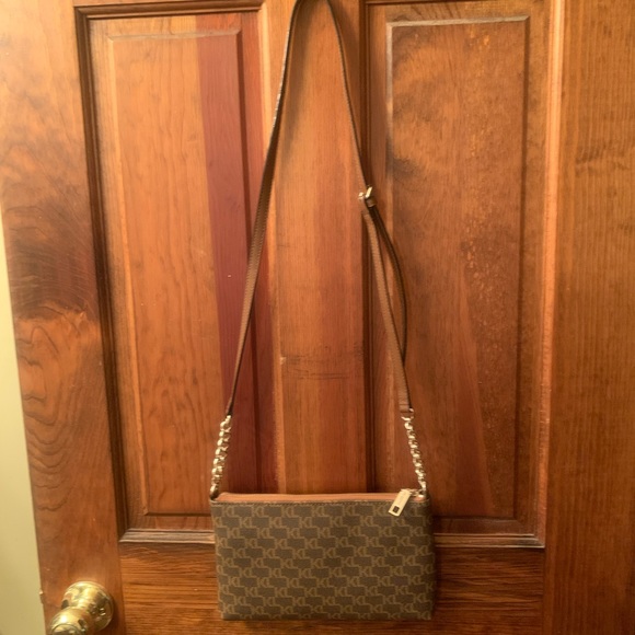 Karl Langerfeld, crossbody bag. Brown K L signature. 4 inches of chain on strap. - Picture 10 of 11